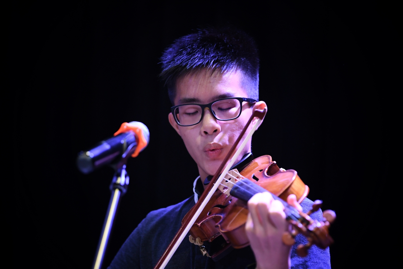 Lim Jing Rui, 13, performs a whistling act during the auditions for the 18th ChildAid concert on August 13, 2022  ST PHOTO: CHONG JUN LIANG